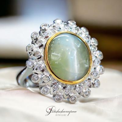 [28611] 8 carat cat's eye lapis ring surrounded by diamonds.  119,000 